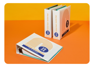 Avery view binders with self-printed cover sheet inserts used to customize the front design of binders.