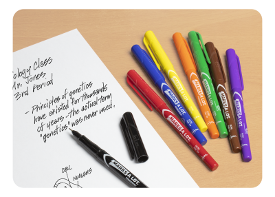 Multiple Avery Marks A Lot markers in a rainbow of different colors next to a sheet of notes.