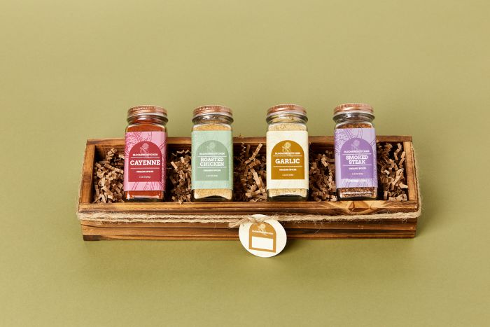 A food gift box filled with spices and personalized with Avery labels and tags