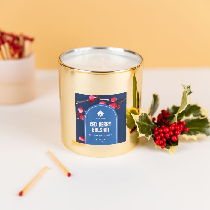 Red Berry Balsam Candle featuring a 2" square Avery Label and a gold tumbler jar from candlescience