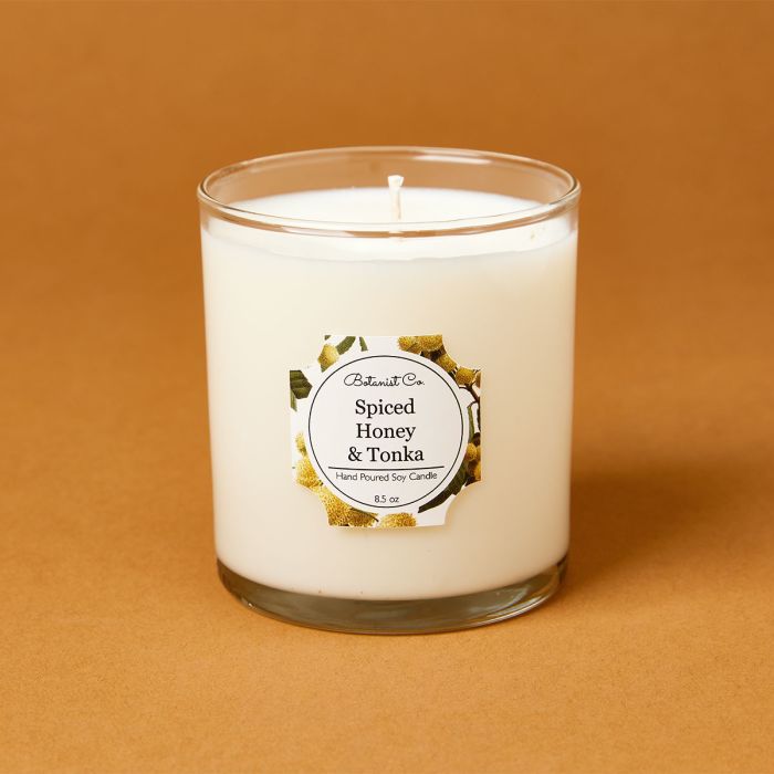 candle science spiced honey and tonka candle scent featuring avery candle label