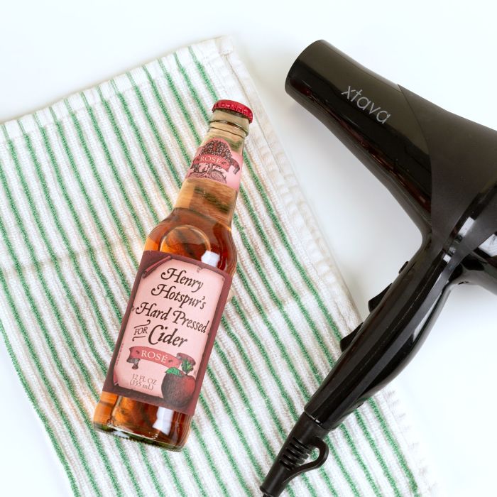 use a hair dryer to help remove bottle labels
