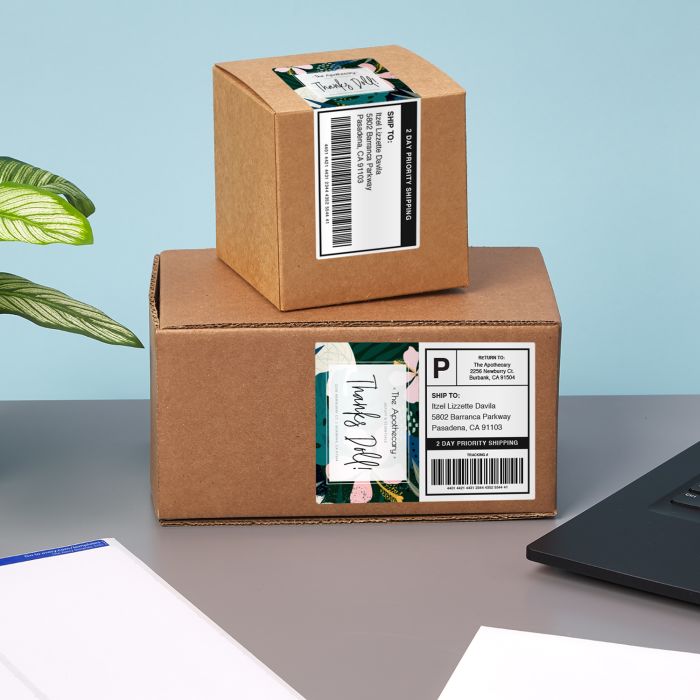 Shipping boxes with shipping labels and personalized labels