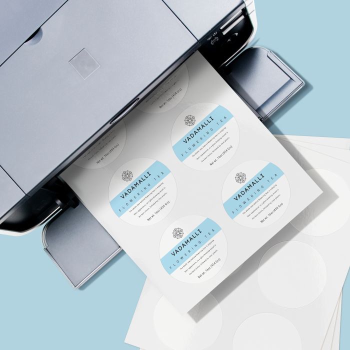 A printer showing Avery printable labels being printed 