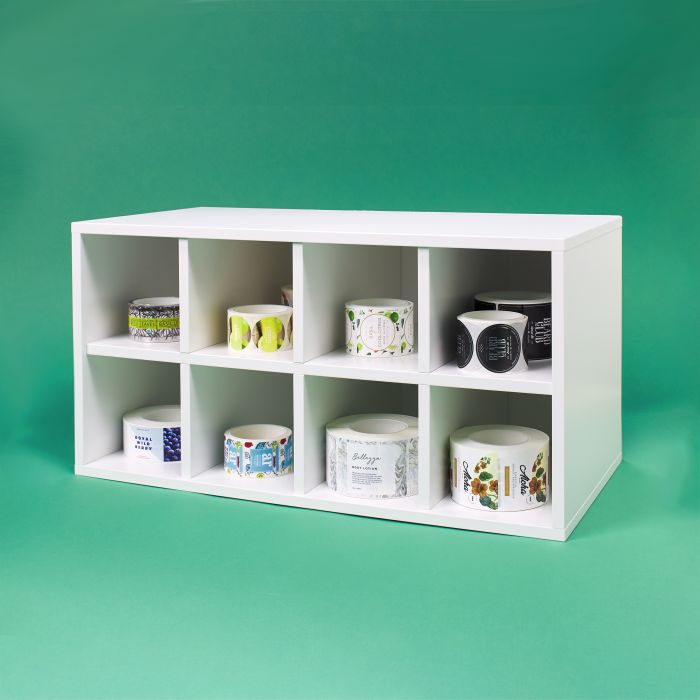 Shelves with cubbies used to keep roll labels organized