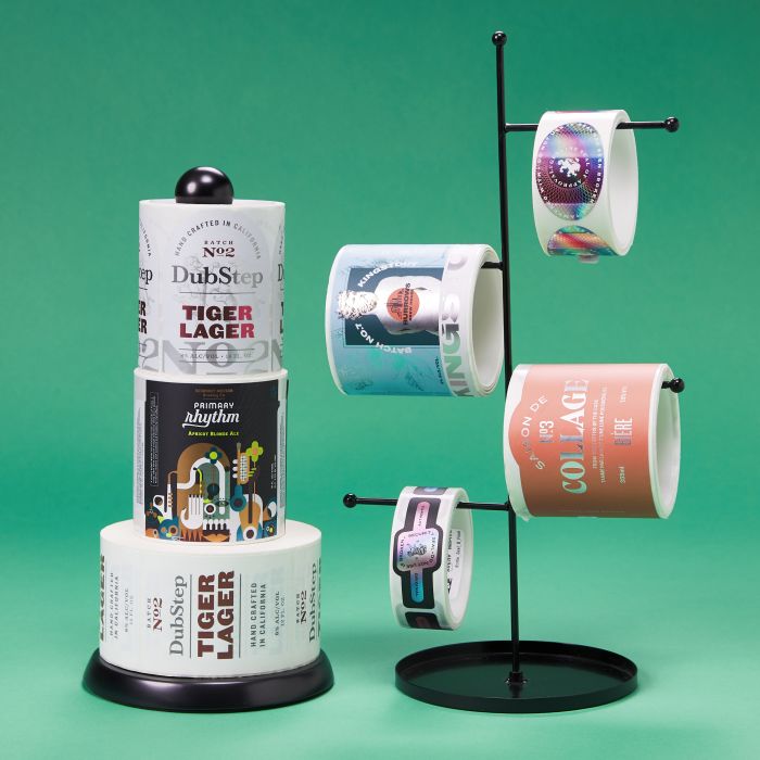 A simple paper towel holder makes a space-saving roll label holder and applicator for small businesses.