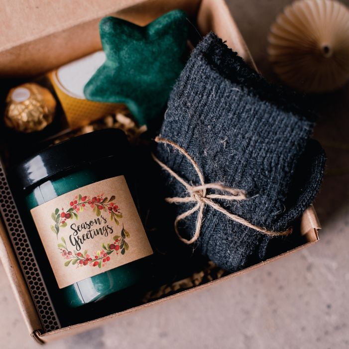 Give an inexpensive gift to clients with this great idea of socks and a scarf