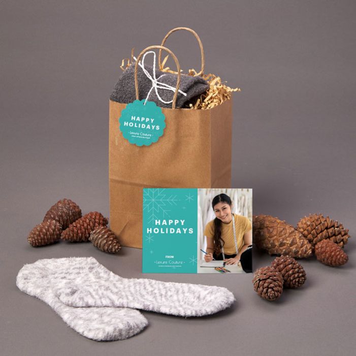 Give an inexpensive gift to clients with this great idea of socks and a scarf