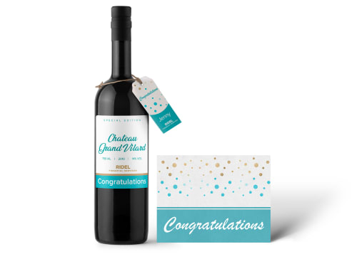 Wine bottle with a printed label applied and a tag tied onto it, standing next to a printed business card. Each printed product features a 'Congratulations' message from a financial services company