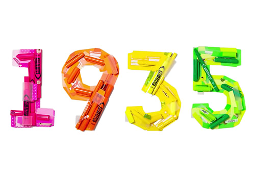 '1935,' the founding year of Avery, with each digit spelled out in a different color- pink, orange, yellow and green respectively