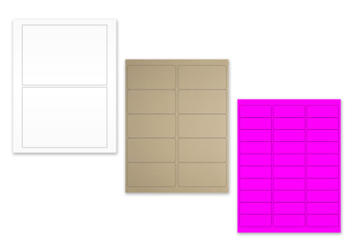 Flatlay of 3 distinct sheets of labels sitting in a diagonal line. The first is a 2-up sheet of white labels, the second is a 10-up sheet of kraft brown labels, and the third is a 30-up sheet of neon pink address labels.