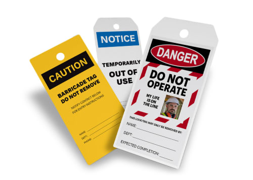 Three industrial tags with caution, notice, and danger designs
