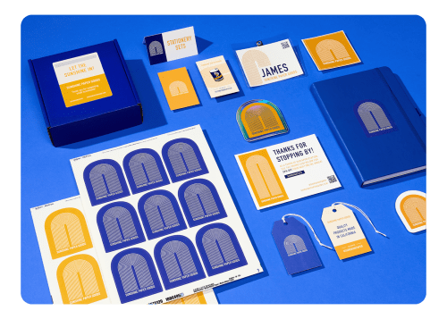 A wide spread of Avery labels and cards printed with unified product branding for marketing materials and product packaging.