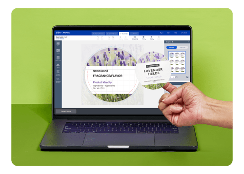 A laptop with Design and Print Online open with a round label design.