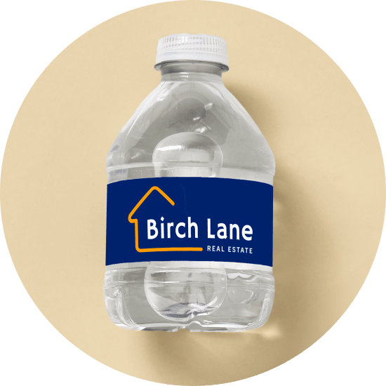 Avery water bottle labels with custom printed real estate branding.