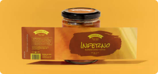 A glass jar of sauce being labeled with a a glossy material label with a luxurious golden brown design.