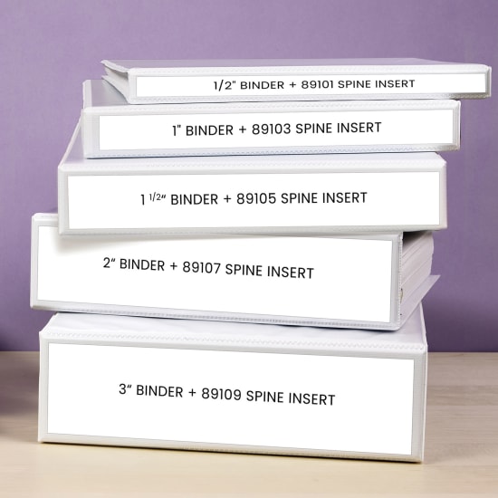 A stack of five white binders, in 1/2 inch, 1 inch, 1-1/2 inch, 2 inch, and 3 inch sizes. Each has a custom binder spine insert that displays each binder's size and SKU number