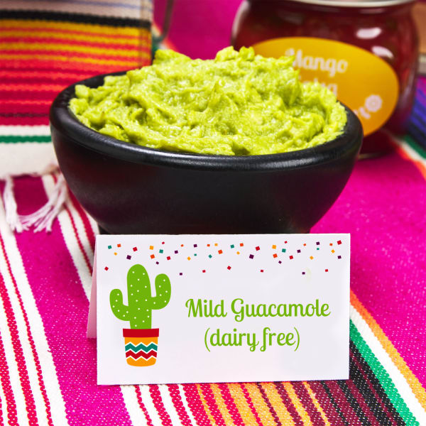 A small Avery tent card 5302 that reads, "Mild Guacamole (dairy free)." The cactus and confetti design is a cute potluck idea for a fiesta or Cinco de Mayo theme.