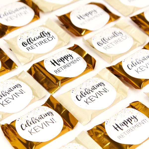 An example of individual gourmet chocolates personalized with labels to fit the occasion. In this case some read, "Happy Retirement," while others read, "Celebrating Kevin," and so on. 