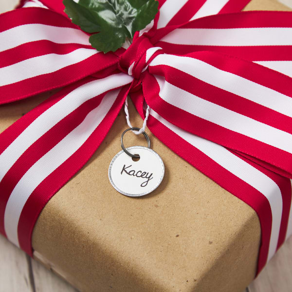 Hand written gift tag using Avery 11025 metal-rimmed key tags. 