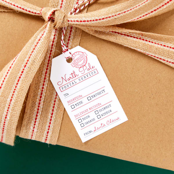 Brown paper and North Pole "postal service" gift wrap idea using Avery 22802 and a free template. 
