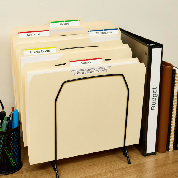 Desk organization showing files neatly organized in a desktop holder. The file folders are labeled with clear Avery file folder labels 5029.