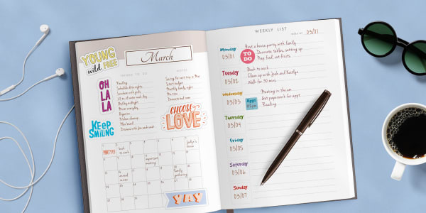 A photo of an open planner demonstrating the use of DIY planner stickers for decorating versus more practical uses like day labels, to-do lists, and appointments. 