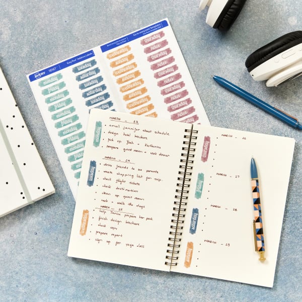 Custom planner stickers bullet journal weekdays made with Avery 18167 labels. The labels feature a free, customizable Avery template. 