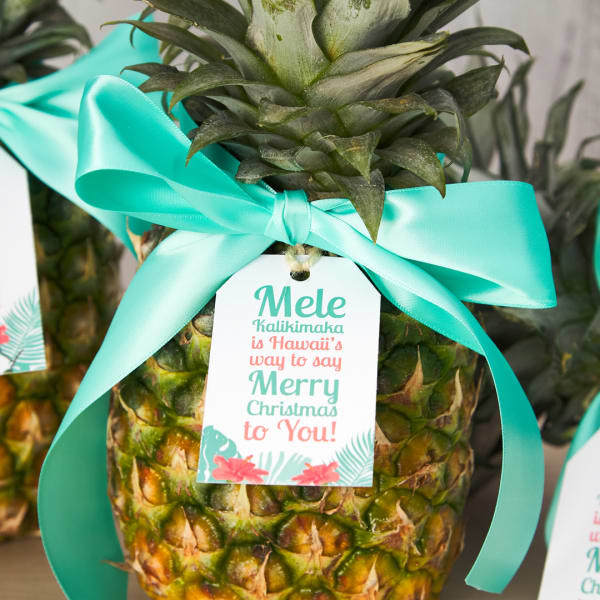 Hawaiian Christmas pineapple gift tag is made with Avery 22802 tag. It reads," Mele Kalikimaka is Hawaii's way
To say Merry Christmas to you!"