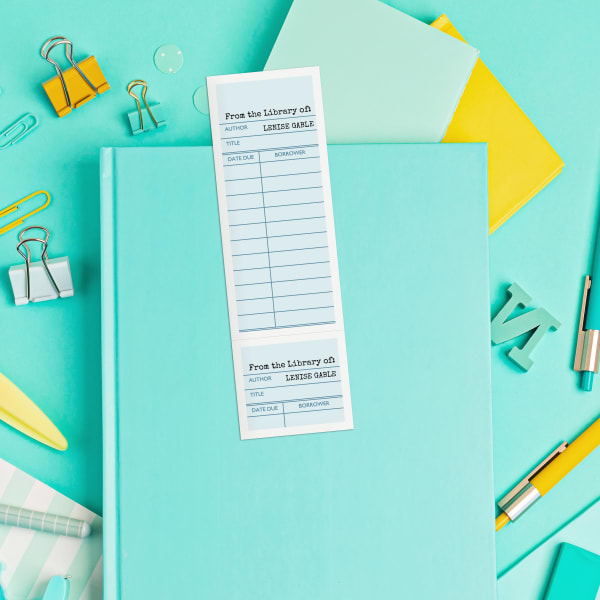 A printable bookmark design printed on an Avery ticket that shows the check-out history of a library book.