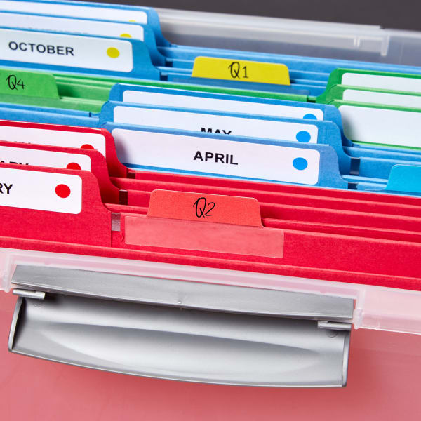 Colorful file folders organized by month and quarter using Avery file folder labels and Avery Ultra Tabs.