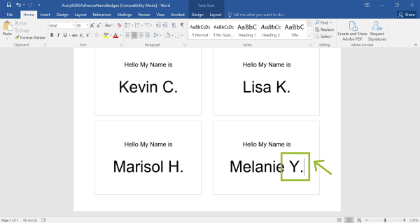 Screenshot of a Microsoft Word document displaying an Avery name tag template filled with multiple name tags. The tags show 'Hello My Name is' followed by names: Kevin C., Lisa K., Marisol H., and Melanie Y. A green arrow points to the last name tag with 'Melanie Y.,' highlighting the ability to edit text within the template. The Word interface displays the toolbar with formatting options like font type, size, and alignment, as well as various tabs such as Home, Insert, and Mailings.
