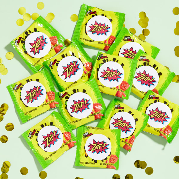This is an example of an inexpensive DIY party favor made with Sour Punch candies and Avery 22807 labels. The individual-sized bags of candies have labels that read, "Zap!" stylized like a comic book callout.