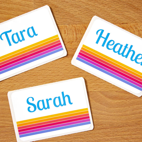 Name tags with retro striped design printed on Avery 8395 name tags.