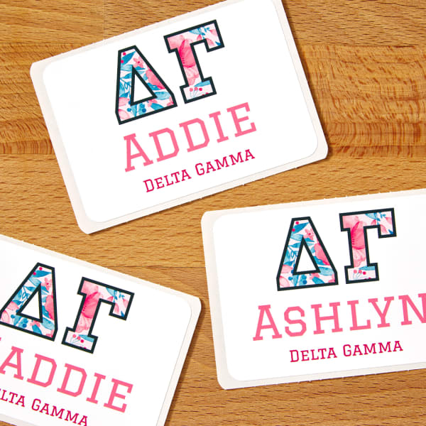 Sorority name tags with tropical print Greek letters printed on Avery 8395 name tags.