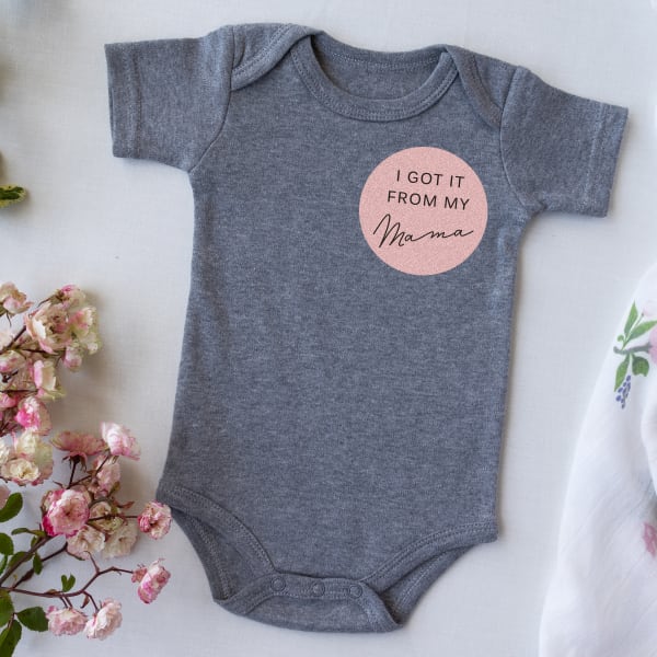 Image showing Mother’s Day baby onesie that reads “I got it from my mama.”