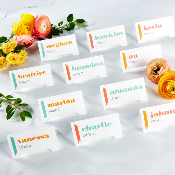 Table of wedding escort cards using Avery tent cards and templates