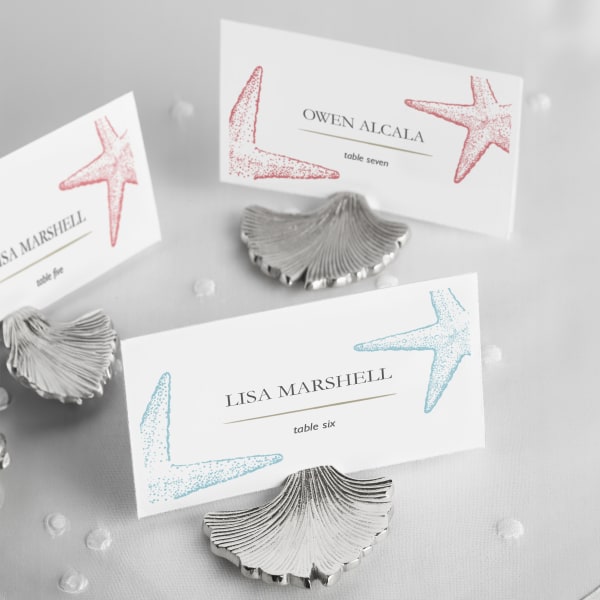 Wedding place cards with different colored Avery templates to indicate different meal choices