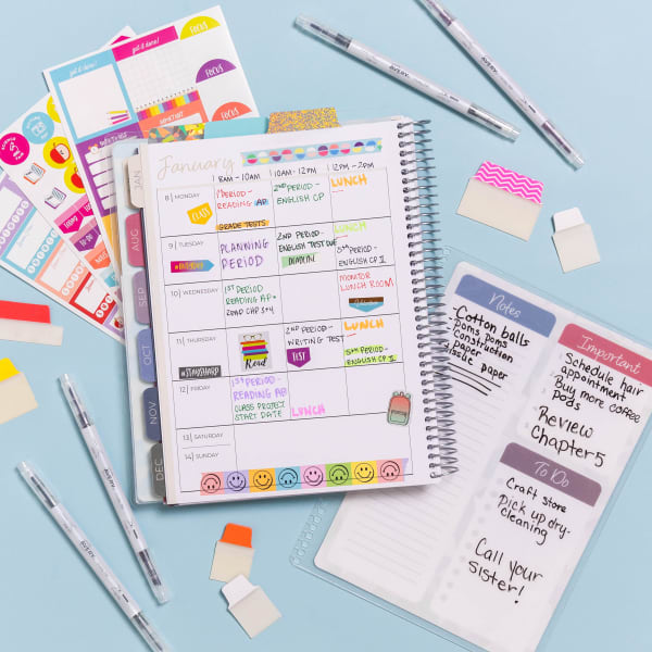 Avery teacher planner 29874 with dated tabs July through June surrounded by Avery planner supplies including a reusable wet-dry dashboard, planner stickers, and Ultra Tabs. 