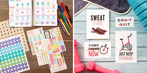 Personalized planner surrounded by custom-printed planner stickers, planner sticker sheets and markers on a wood desk and a set of cards decorated with motivational designs