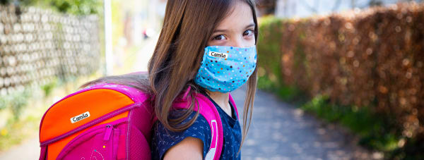 elementary school girl with face mask backpack camilla kids label