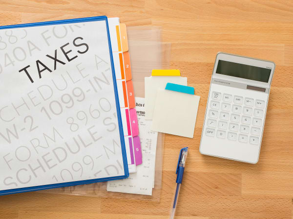 Get organized for taxes with binder, ultra tabs, pen, calculator