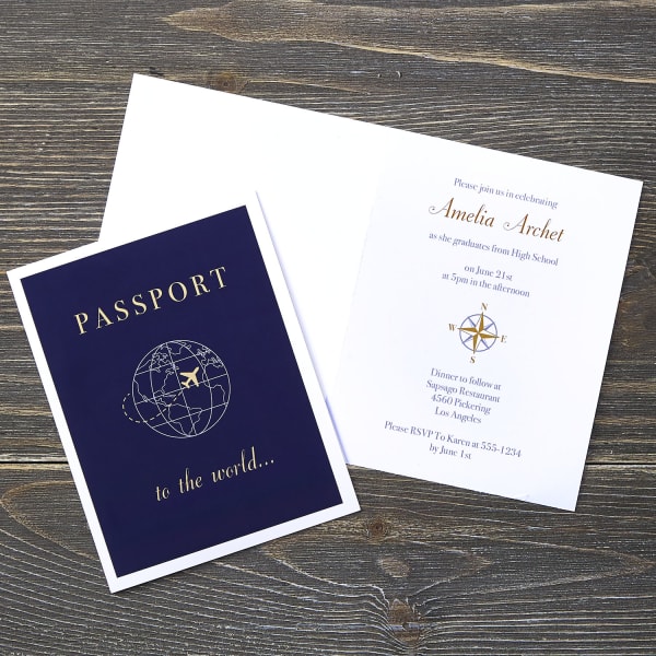 blue travel passport invitations on wood table