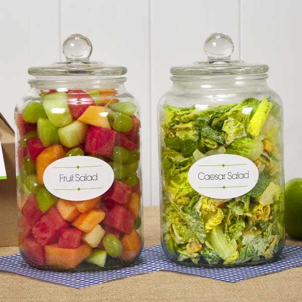 fruit and caesar salad in jars
