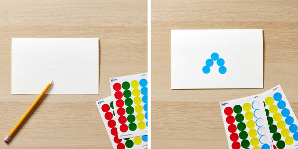 step one and two to making a rainbow card showing tracing the rainbow arcs with pencil on blank avery greeting cards and then starting the blue rainbow row with avery color coding stickers