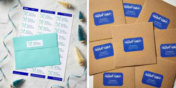 A sheet of holiday address labels on a marble surface and Kraft brown envelopes with full-bleed blue address labels.
