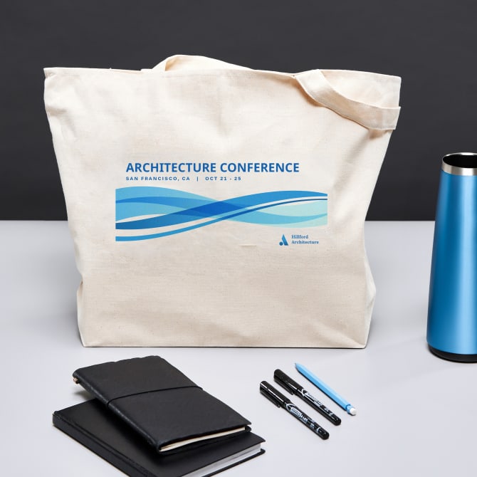 Canvas tote bag with a customized Avery fabric transfer 3271 shown used as a branded  swag bag for an architecture conference.