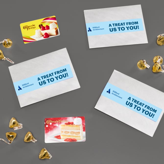 Small gift card bags with Avery wrap around labels that read "A treat from us to you!"