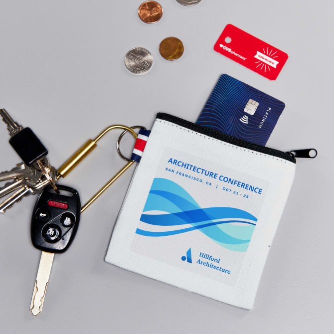 A canvas keychain coin purse customized with Avery fabric transfer 2235.