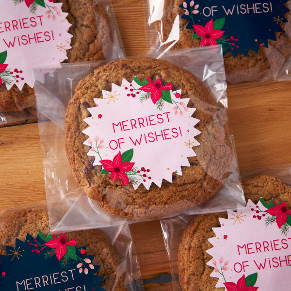 Cookies in small bags with round, festive poinsettia labels
